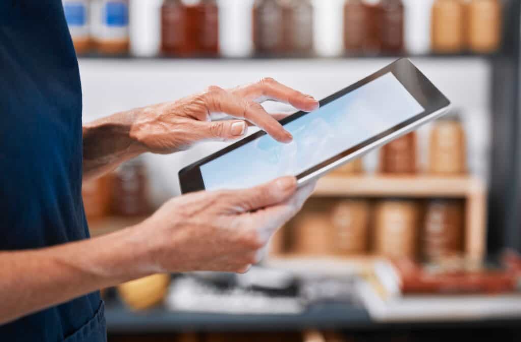 Digital tablet, hands and mockup screen with typing for online research on internet with technology