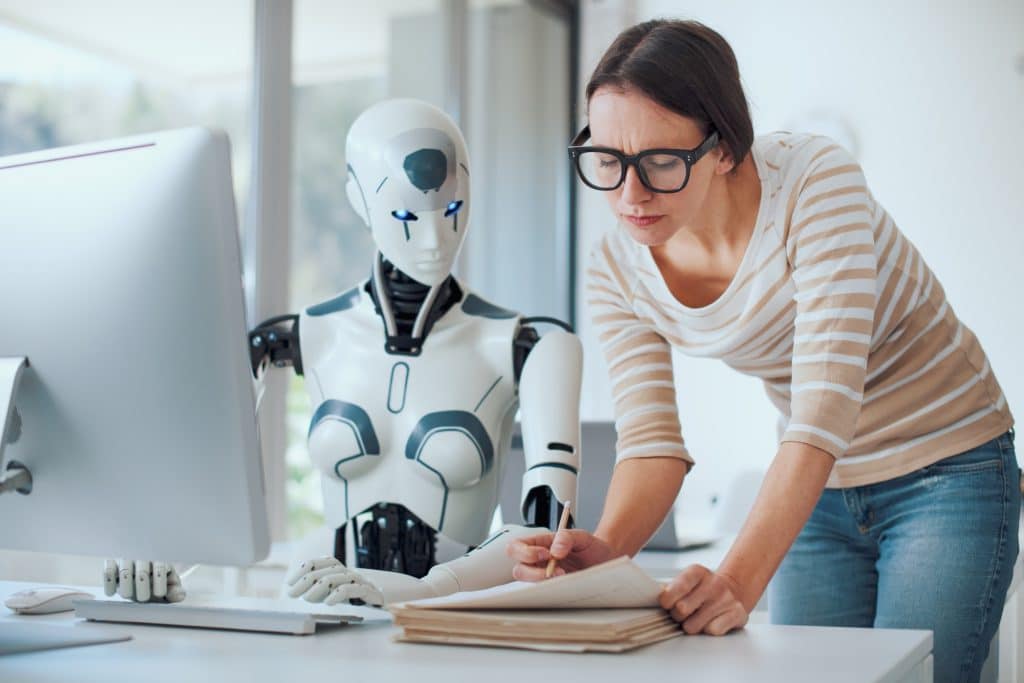 Woman and AI robot working together